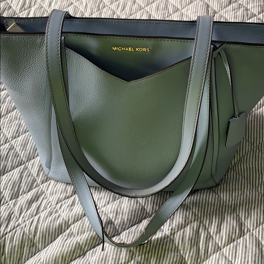 Used Michael Kors sky blue purse